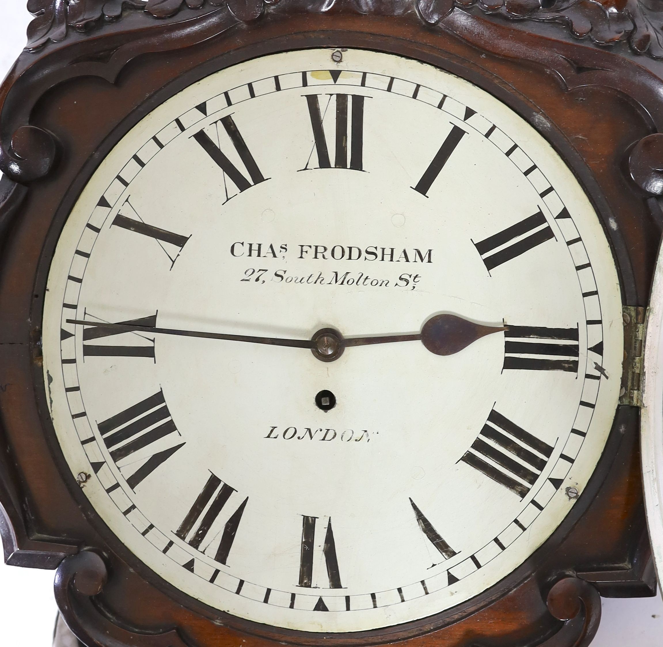 Charles Frodsham, 27 South Molton Street, London. A Victorian carved mahogany drop dial wall timepiece, width 48cm, height 76cm